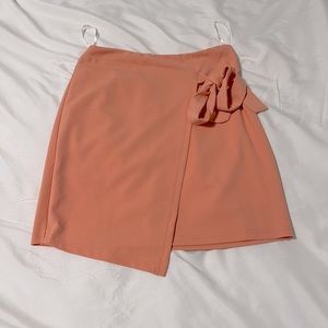 Coral/pink mini asymmetrical skirt.💞
